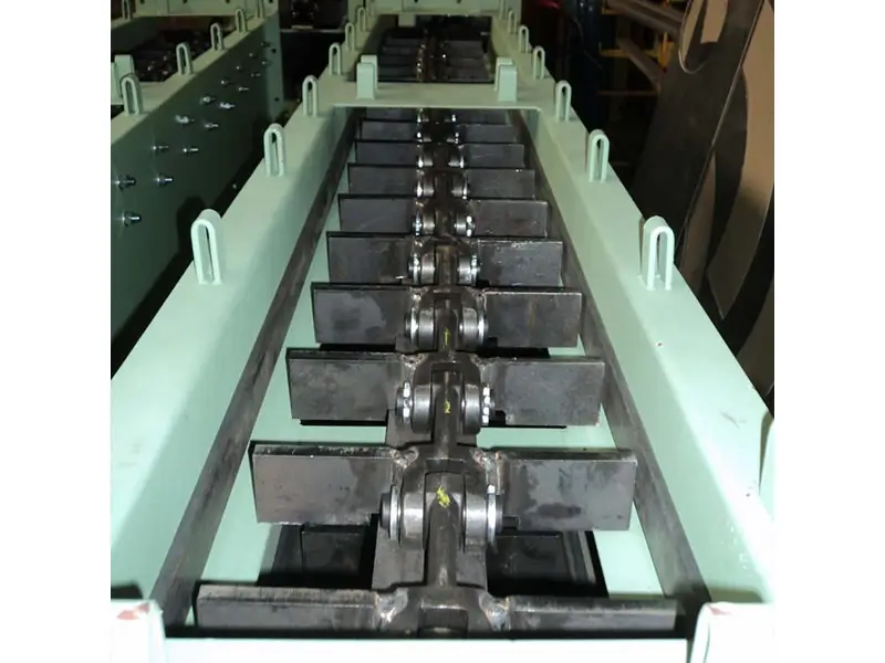 En-masse conveyor